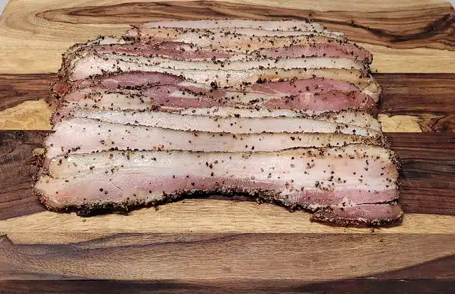 Ough Meat Processing 3 DCP Peppered Bacon on wooden board